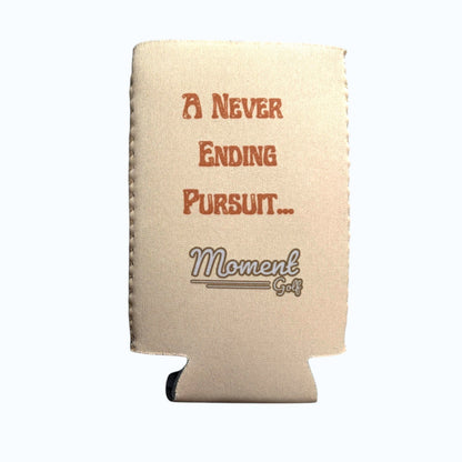 Moment Golf slim can koozie featuring an autumn landscape print and the text A Never Ending Pursuit on a cream base.