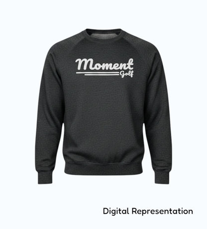 Moment Golf charcoal grey crew neck sweatshirt with raglan sleeves and a white vintage script logo on the chest.
