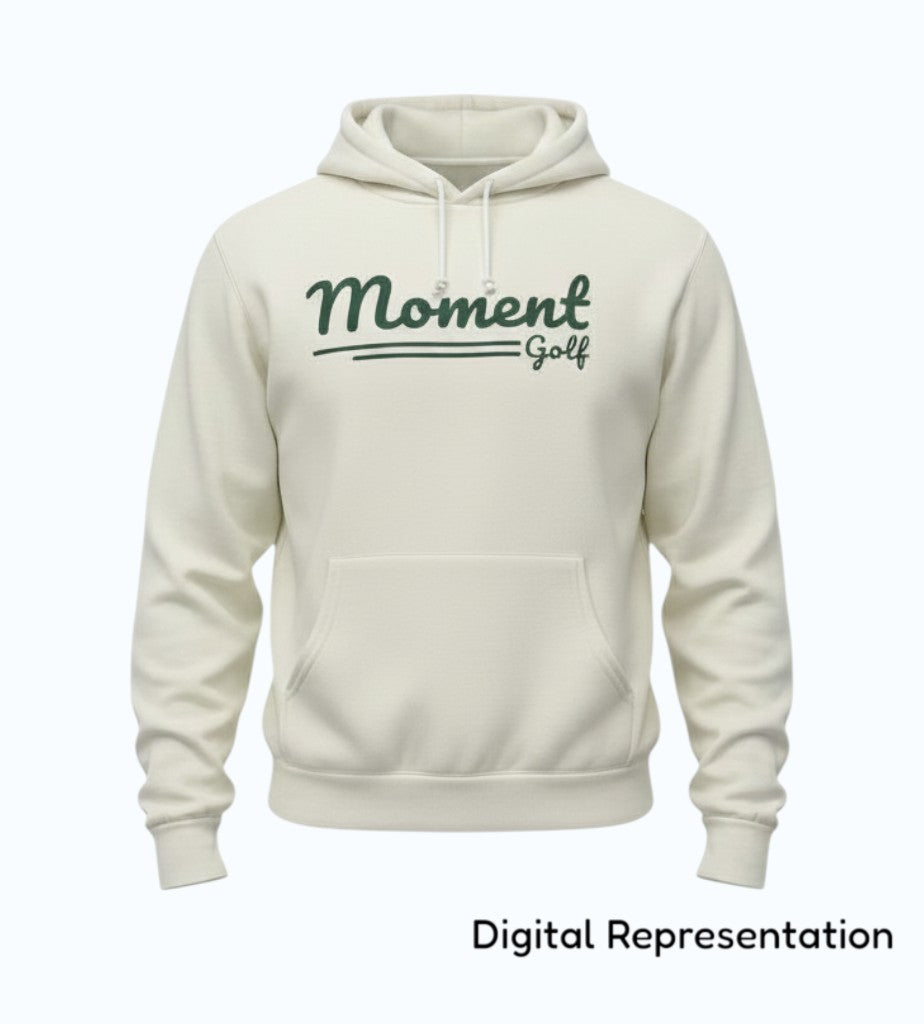 Moment Golf premium fleece hoodie in off-white with a forest green scripted logo and relaxed fit.