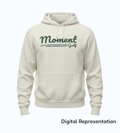 Moment Golf premium fleece hoodie in off-white with a forest green scripted logo and relaxed fit.