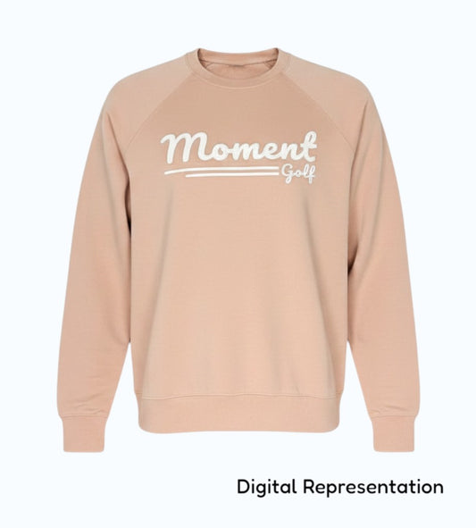 Moment Golf Script Logo crew neck sweatshirt in tan cotton-polyester loopback terry with raglan sleeves.